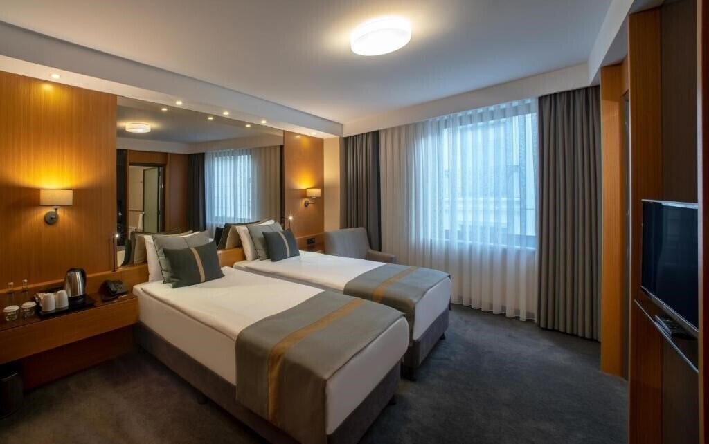 Фото Tan Hotel Class "S" 4*
