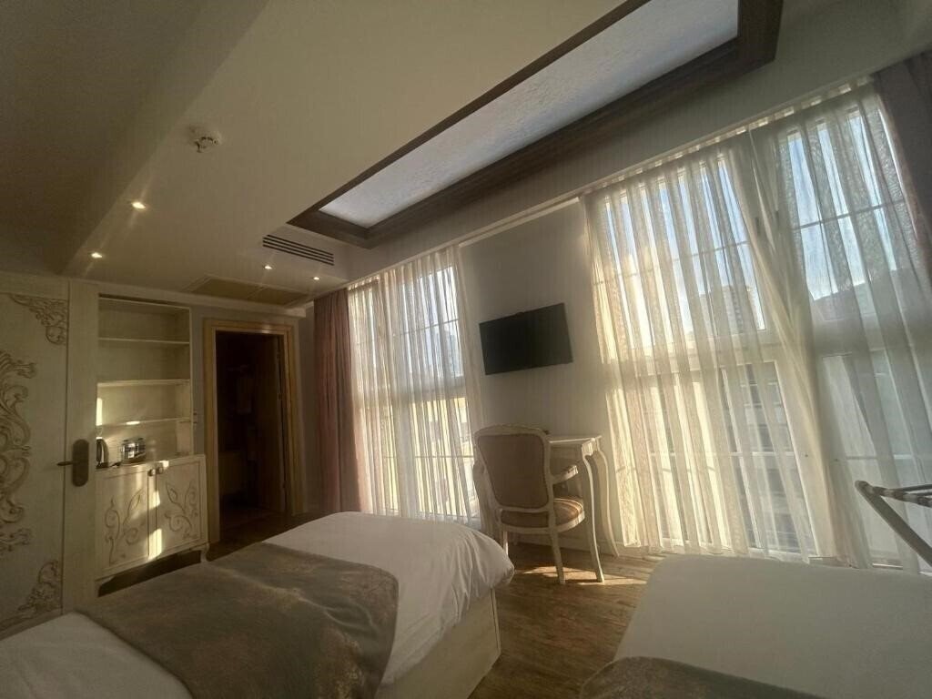 Elegance Asia Hotel 3* суреті