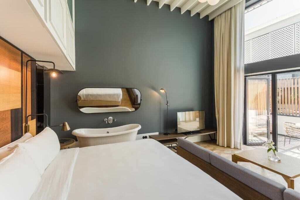 Фото Room Mate Emir 4*