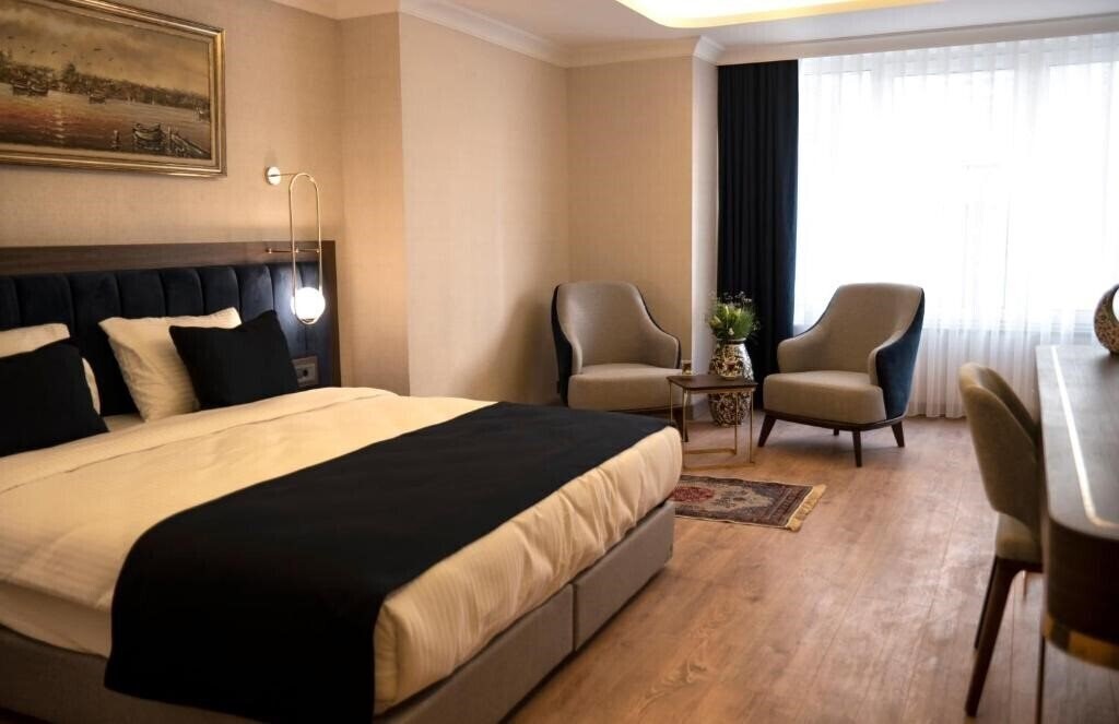 Отель Nevi Hotel & Suites 4*