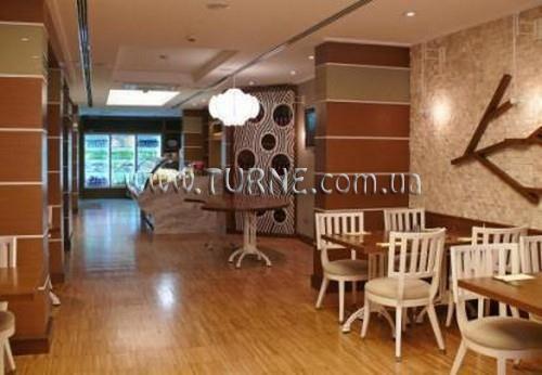 Изображение Housez Suites & Apartments 4*