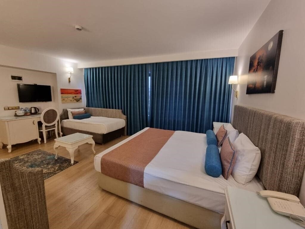 Taximtown Hotel 4* фотосуреті