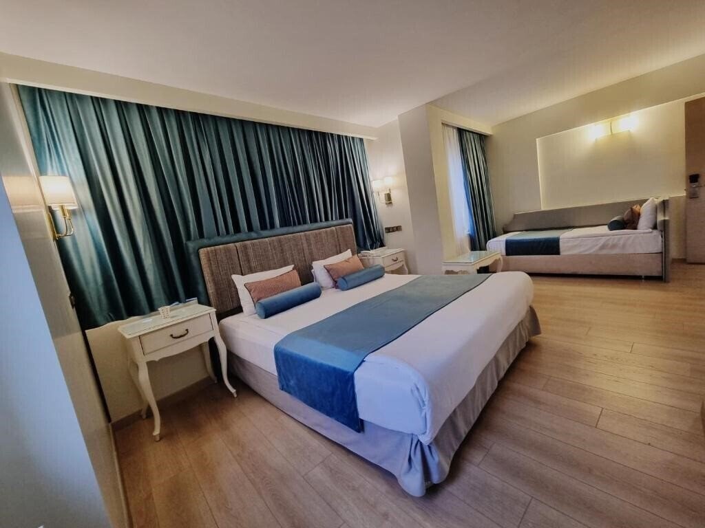 Taximtown Hotel 4* суреті