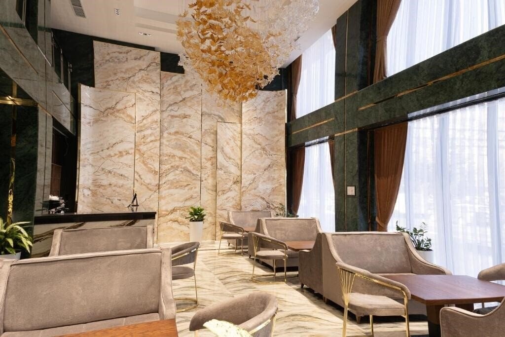 Mir Luxe Plaza 4* суреті