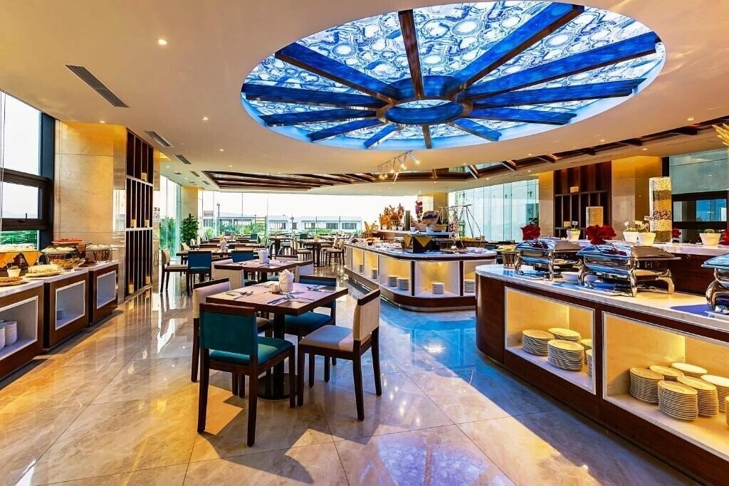 Фотография Maximilan Danang Beach Hotel 4*