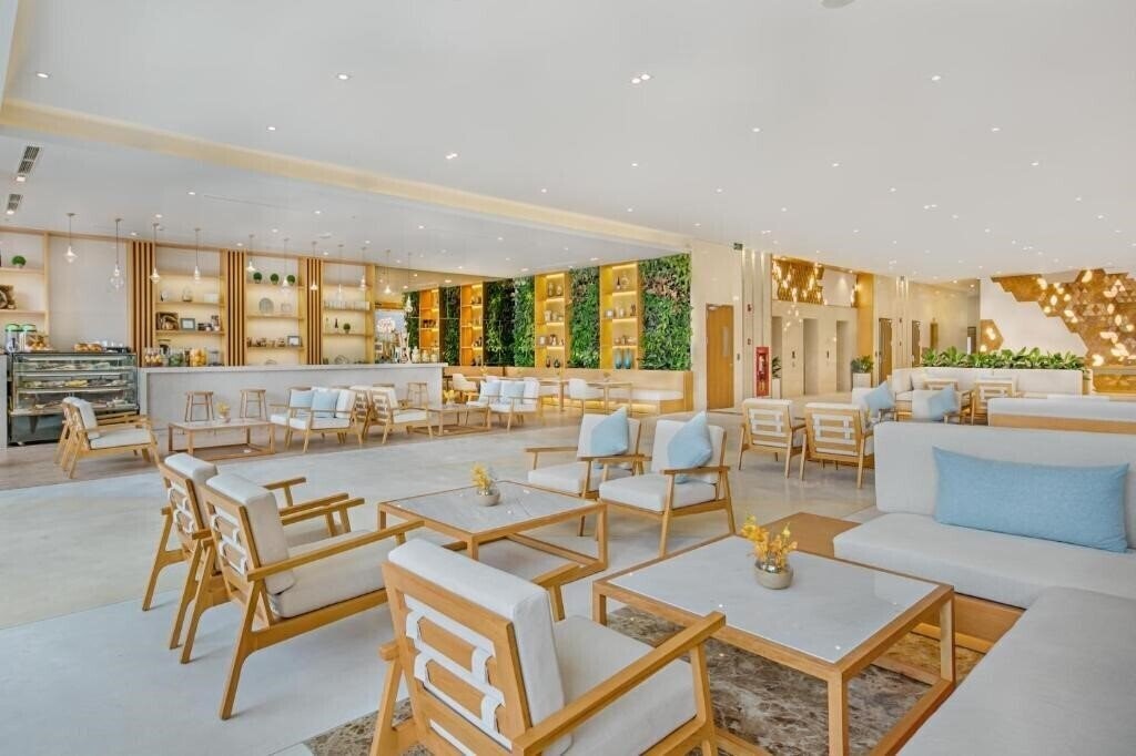 Фото Tms Hotel Da Nang Beach 4*
