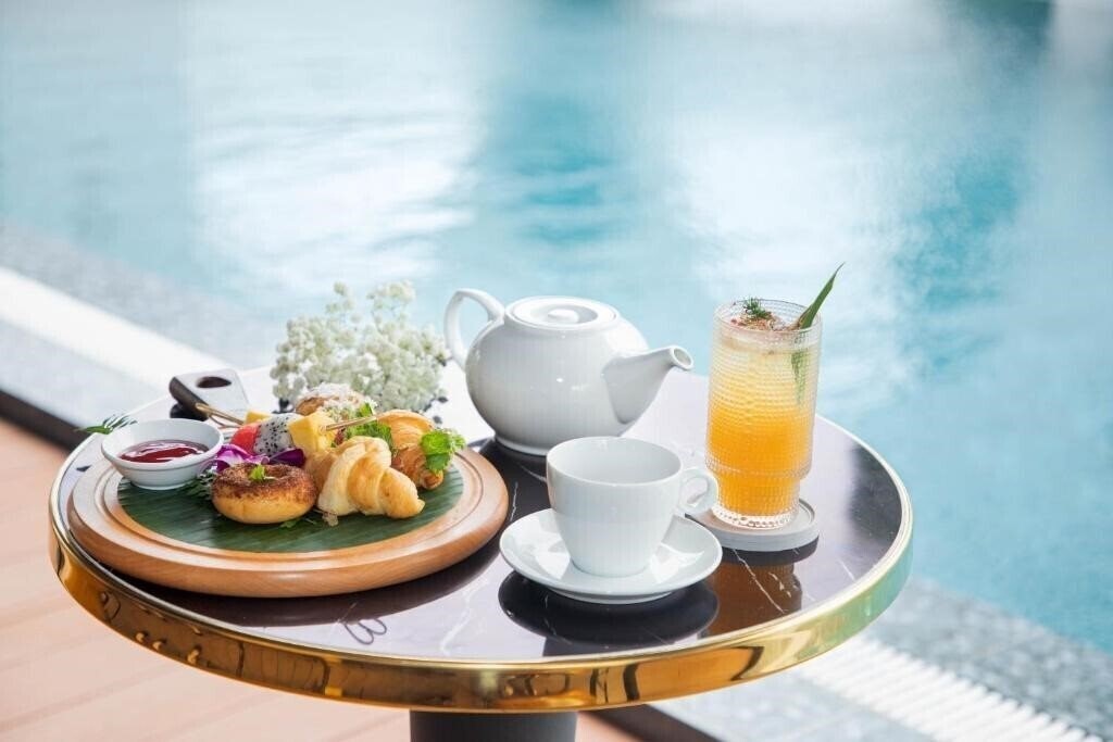 Фото Golden Lotus Hotel Da Nang (ex. Golden Lotus Danang) 4*