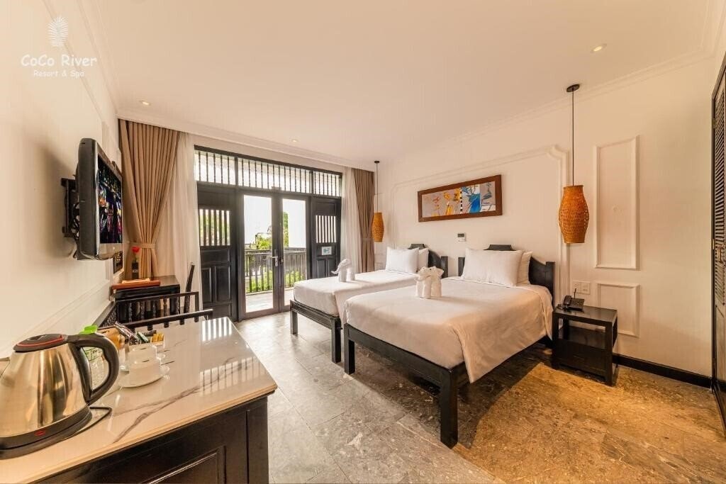 Фото Hoi An Coco River Resort & SPA 3*