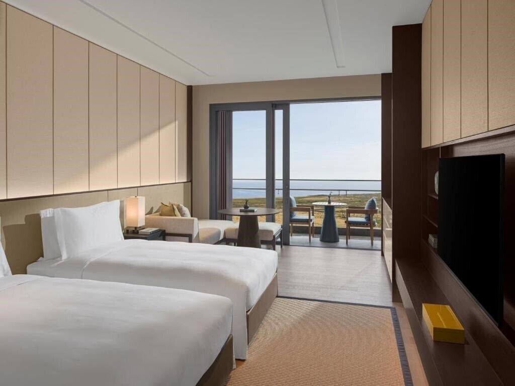 Фотография New World Hoiana Hotel 5*